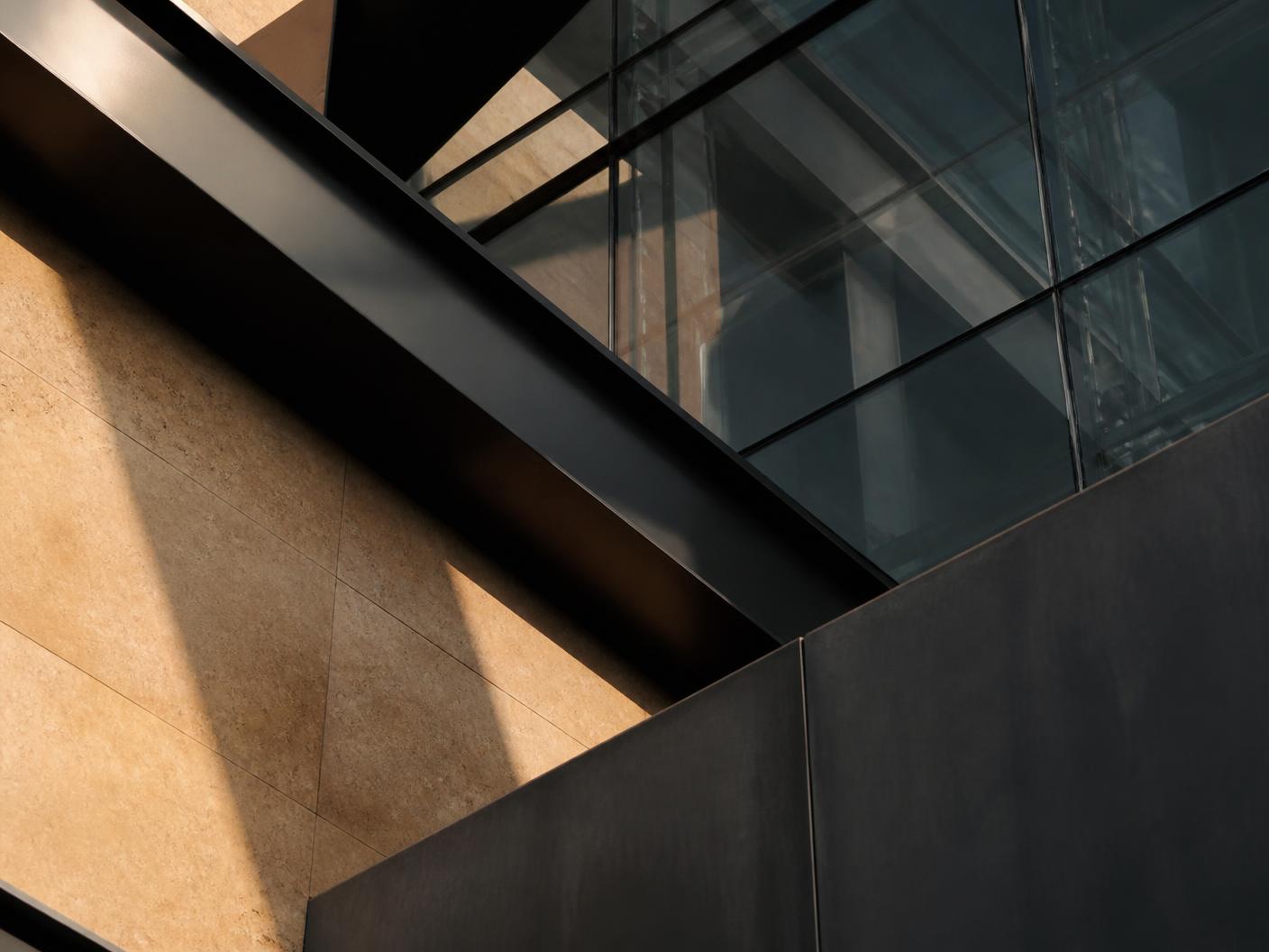 Steel, glass and stone intersecting in modern architecture